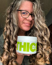 Woman with leave in conditioner for thick hair